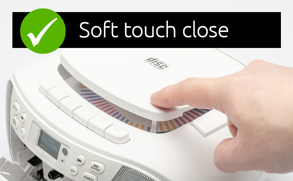 Soft touch close CD player lid